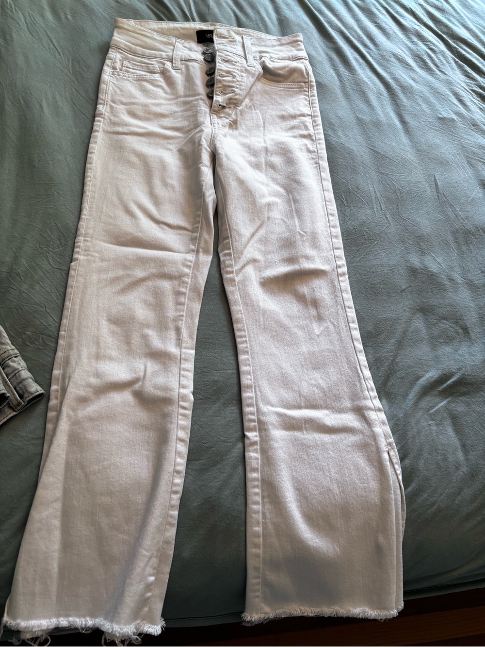 High-Rise White Flare Jeans with Raw Hem